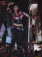 giantess collage city black_hair clothed low_angle smiling celebrity people photoshoot dancing dark_skin magazine night thigh_length_boots nicki_minaj magazine_shoot