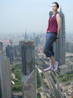 giantess collage city barefoot traffic freeway leaning_against_building looking_at_viewer smog