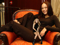 collage brunette sitting lesbians shrunken_woman looking_at_viewer armchair