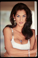 giantess blue_eyes clothed face earrings bracelet between_breasts