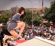 collage high_heels buildings brunette asian kneeling short_skirt people looking_at_viewer crowds grey_dress mrscaryface