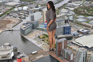 giantess collage city black_hair butt high_heels legs dark_skin looking_at_viewer vogelfd nyomi_banxxx behind_view