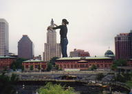 giantess collage city black_hair clothed jeans black_top
