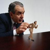 collage office shrunken_woman captured desk business_woman between_fingers business_man
