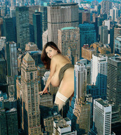 giantess collage city huge_breasts brunette bending_over milena_velba mature looking_at_viewer between_buildings