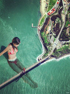 giantess collage mega black_hair swimsuit bridge water high_angle sunny japanese_text golden_gate_bridge sjw above_view