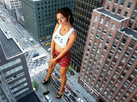 giantess collage city black_hair high_heels traffic high_angle short_skirt streets looking_at_viewer golf_club between_buildings above_view