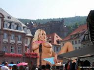 breasts giantess collage city blonde sitting village shrunken_people looking_at_viewer tackleberry