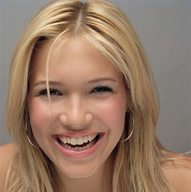 blonde climbing smiling shrunken_men face close_up photograph looking_at_viewer climbing_up_hair