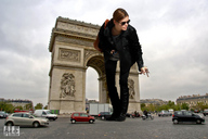 giantess collage clothed handheld traffic brunette bending_over arch sunglasses captured clouds paris jacket knee_high_boots azzy_ale arc_de_triomphe