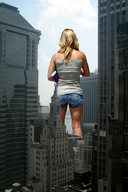 giantess collage city blonde unknown_artist shorts skyscraper rooftop_view behind_view