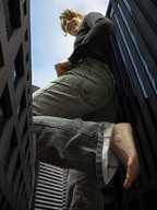 collage feet city mega blonde barefoot buildings jeans low_angle smiling skyscrapers point_of_view looking_at_viewer