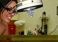 collage glasses smiling shrunken_men face laboratory shrinking_machine female_scientist examining