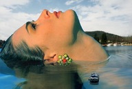 giantess collage mega black_hair unknown_artist swimming lake boats reflection necklace earrings floating head_view