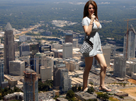 giantess collage city clothed cleavage buildings brunette dress unknown_artist legs walking skyscraper flip_flops