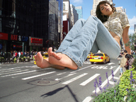 giantess collage city clothed barefoot buildings brunette unknown_artist sitting people streets vehicles