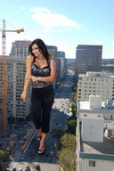 giantess collage city clothed buildings brunette unknown_artist walking streets breast_play vehicles denise_milani looking_at_viewer crane