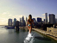 giantess city swimsuit brunette wonderslug skyscrapers wading behind_view