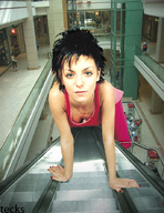 collage brunette tecks looking_at_viewer pedestrians shopping_mall escalator