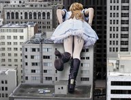 giantess collage city blonde butt skirt high_heels buildings dress nylons bending_over looking_down skyscraper standing streets curly_hair alice_in_wonderland source_needed roof