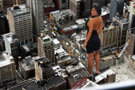 giantess collage city clothed unknown_artist legs skyscraper streets back vehicles denise_milani looking_at_viewer taxi above_view