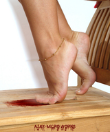crush collage feet toes barefoot blood shrunken_men sitting foot_crush arm ajax chair