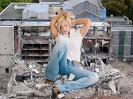 giantess collage blonde destruction clothed buildings wonderslug shrunken_men sitting muscles rubble looking_at_viewer athlete jamie_eason