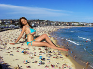 collage large_breasts swimsuit beach barefoot wonderslug sitting closed_eyes jordan_carver crowds