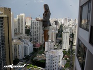 giantess collage city destruction clothed buildings helicopter brunette bus looking_down skyscraper captured nikemd sky olivia_munn looking_at_tiny holding_vehicle