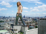 giantess collage city clothed jeans brunette wonderslug river skyscrapers clothing looking_back looking_at_viewer behind_view natasha_hamilton atomic_kitten