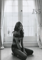 collage monochrome clothed brunette shrunken_men kneeling reaching looking_down clothing floor