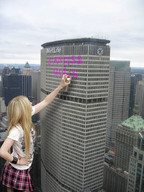 collage city blonde clothed unknown_artist avril_lavigne skyscrapers clothing rooftop_view spray_paint giantess_rules