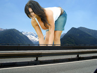 giantess collage cleavage smiling wonderslug bending_over mountains highway denise_milani looking_at_viewer overpass