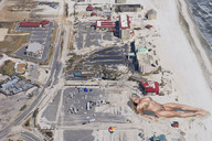 collage blonde swimsuit beach buildings wonderslug muscles foot_print sand parking_lot sunbathing downward_angle