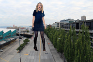 giantess collage blonde nylons standing streets black_dress black_boots taylor_swift joe117