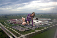 giantess collage landscape destruction high_heels buildings brunette wonderslug kneeling foot_print highway parking_lot looking_at_viewer crushed_car