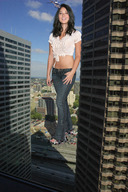 city destruction helicopter jeans brunette wonderslug celebrity bus olivia_munn vehicle_crush looking_at_helicopter bus_in_hand looking_at_tiny holding_vehicle