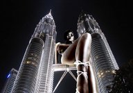 giantess collage city mega low_angle petronas_towers looking_down skyscraper night looking_at_viewer between_buildings sitting_on_building accasbel kuala_lumpur