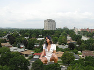 giantess collage city cleavage wonderslug streets houses crouching neighborhood trees looking_at_viewer suburbs rooftop_view