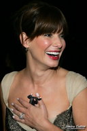 collage cleavage brunette shrunken_men laughing hand_held sandra_bullock earrings