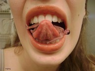 collage vore tongue mouth teeth brunette shrunken_men close_up screaming magmag