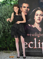 collage brunette black_dress pointing kristen_stewart shrunken_school_bus eclipse_premiere