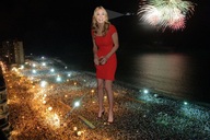 giantess collage beach ocean high_heels helicopter smiling wonderslug dress dark night fireworks lights crowds yvonne_strahovski spotlight