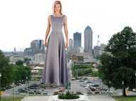 giantess collage city blonde wonderslug dress standing skyscrapers parking_lot statue trees looking_at_viewer crushed_car long_dress elegant_dress