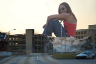 giantess collage destruction clothed handheld smiling sitting sunglasses vehicles parking_garage street_view crushed_building