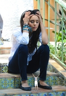 collage clothed shoes brunette shrunken_men sitting steps looking_at_tiny