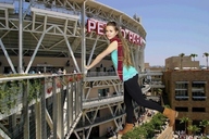 giantess collage clothed brunette stadium boots unknown_artist people looking_at_viewer