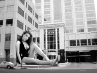 giantess collage monochrome cleavage buildings brunette wonderslug sitting streets vehicles looking_at_viewer