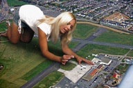 giantess collage mega blonde finger high_heels kneeling hand airplane grass streets houses airport jenni_czech mastershrinker looking_at_tiny