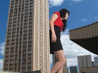giantess collage black_hair clothed buildings low_angle wonderslug sky kirsten_dunst street_view giantess_kirsten